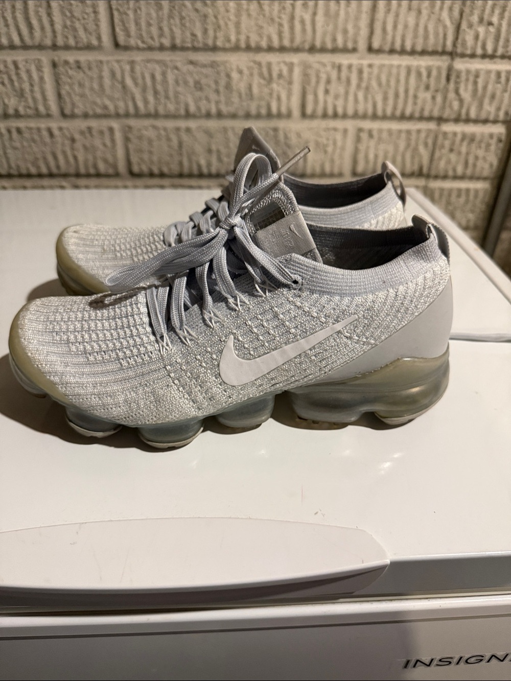 Nike Women’s VaporMax Flyknit Sneakers in Light Gray and White